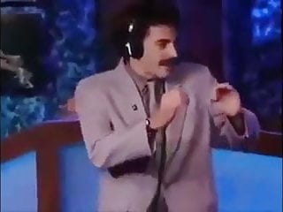 Borat kisses Howard Sterns penis with pants.