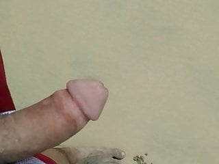 Cumming at a lonely beach