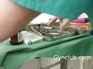 nurse masturbating on a gynecological chair in latex gloves