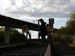 Flashing and masturbating at train track