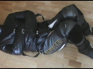 Bikerslave in the leather straitjacket