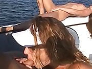 Sexy blonde fucks her husband and girlfriend on a boat 