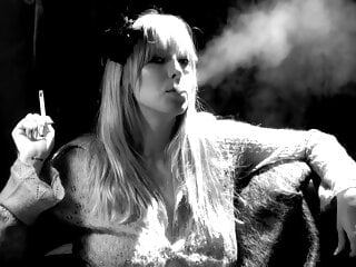 Blonde smokes seductlively