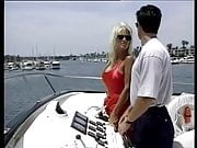 Busty lifeguard gets her amazing tits sucked and gets banged on a boat 
