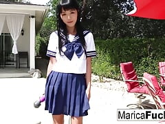 Schoolgirl Marica walks through the house before