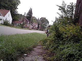 Black Detroit Street Hooker in tight extremely short dress.