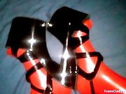 Xtreme high heels in latex stockings