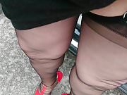 Outside in nylons and high heels