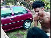 Hot Brazilian cutie Sandra  proposed her friends to wash their car and to have some bisexual fun on the lawn