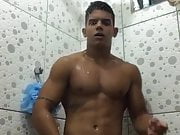Latino showers and shows off
