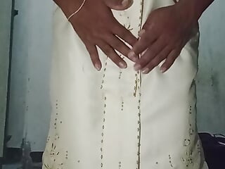 Crossdresser in Thai dress with her beloved dildo