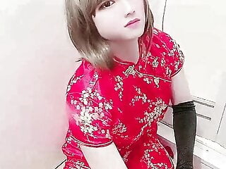 Japanese crossdresser Miya masturbates with Chinese red dress 8