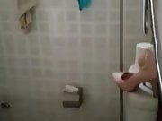 Playing slut heels in the bathroom