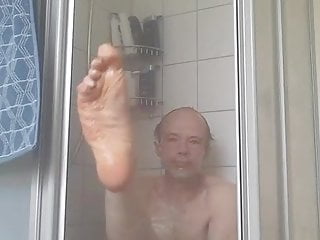 Feet under shower...