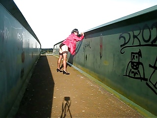 In the pink on a bridge