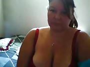 MILF shows big tits on cam