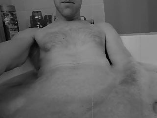 Soaping up my flaccid cock bath...