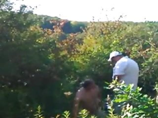 Daddies having fun in the bushes near the beach