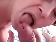 MILF with big tits gives a serious BJ, gets a nice facial.