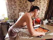 Hot Girl Demonstrate Perfect Boobs and Ass during Cooking