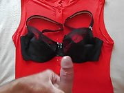 Big cumshot on sexy red dress and black bra .