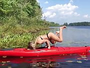 Hot girl in skimpy bikini doing a kayak trick (fail)