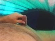 jacking off in tanning bed