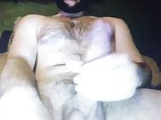 Bearded hairy daddy bear edges his huge hung thick cock